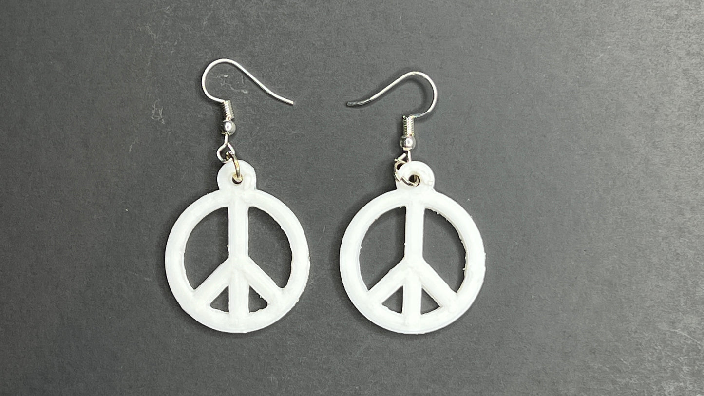 aretes con el logo de la paz